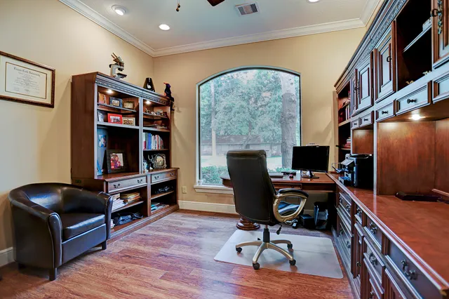 a room with furniture and a flat screen tv