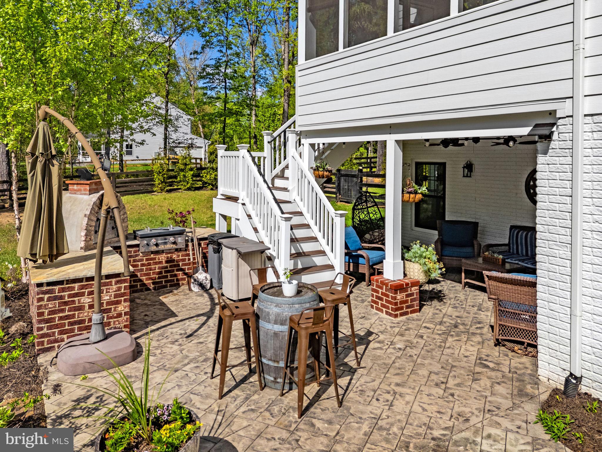 8794 Buckland Mill Road Gainesville, VA 20155 - Photo 58 of 67 Charming outdoor retreat with patio vibes.