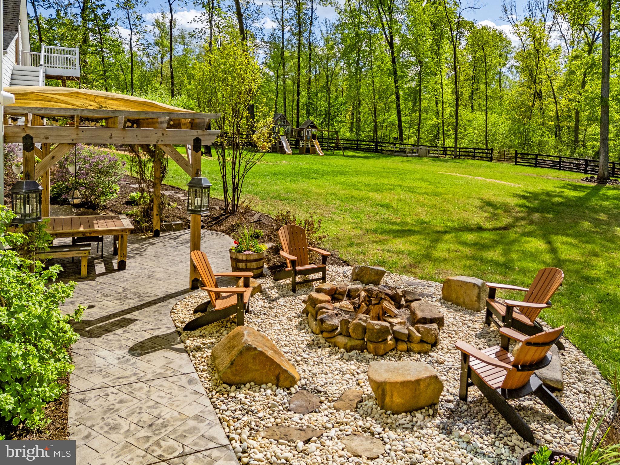8794 Buckland Mill Road Gainesville, VA 20155 - Photo 59 of 67 Charming fire pit oasis in nature.
