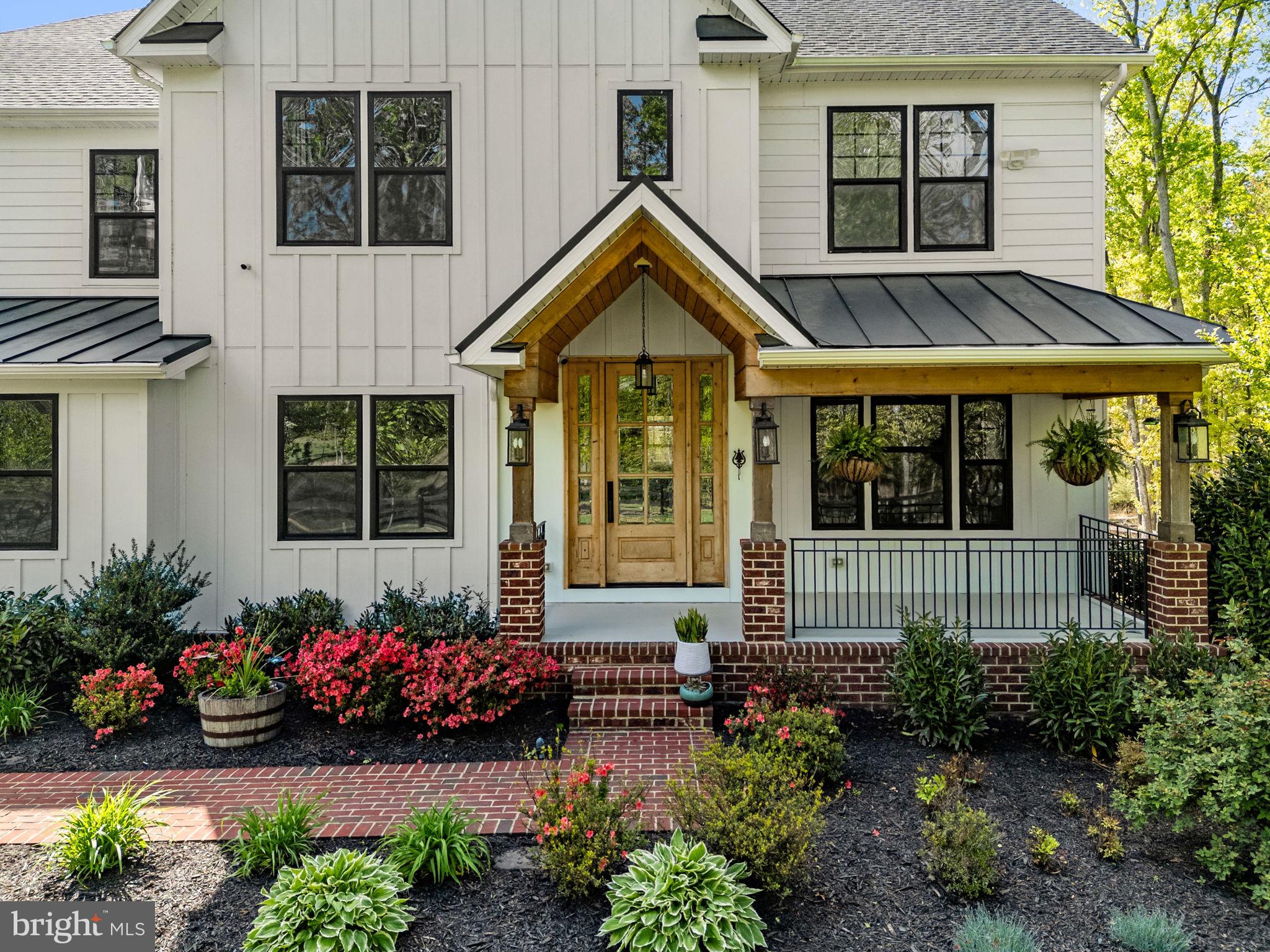 8794 Buckland Mill Road Gainesville, VA 20155 - Photo 7 of 67 Charming entrance with lush landscaping.