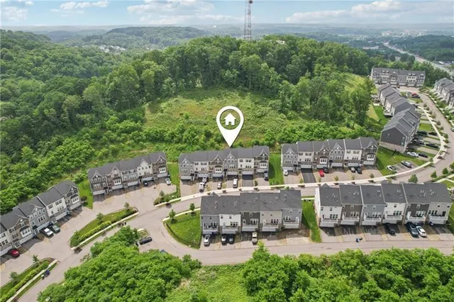 an aerial view of a garden with sitting area