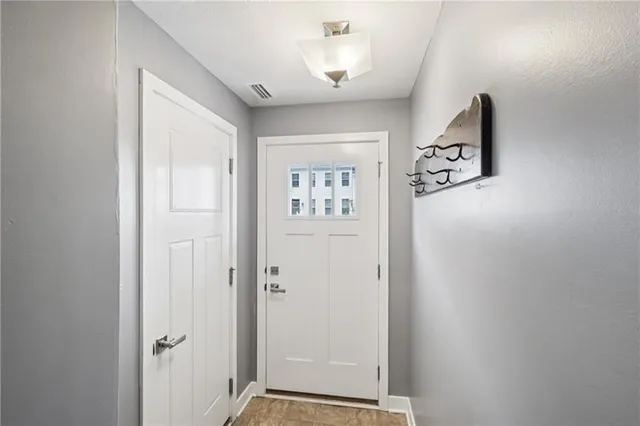 a view of a hallway with elevator