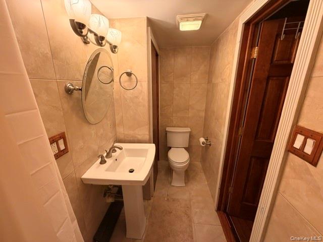 150-06 78th Road Queens, NY 11367 - Photo 22 of 22 a bathroom with a sink a toilet and shower