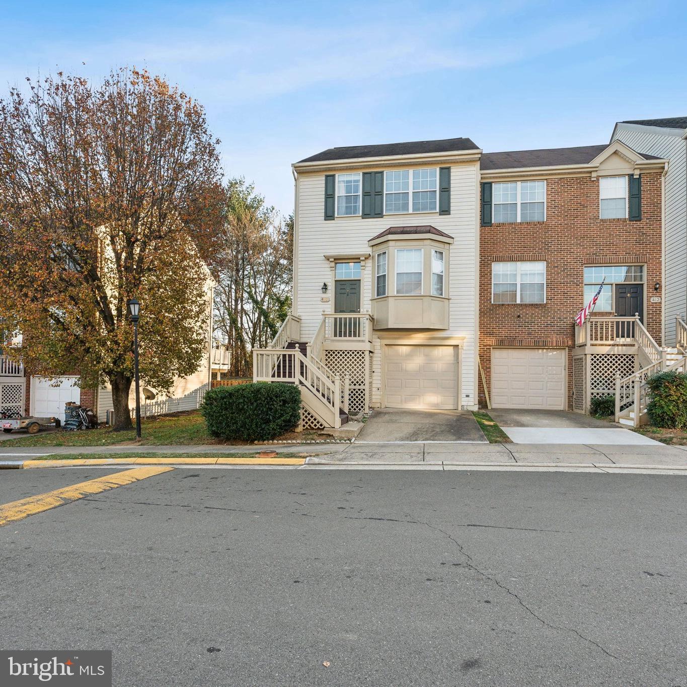 410 McDaniel Drive Purcellville, VA 20132 - Photo 1 of 36 a front view of a house with a yard