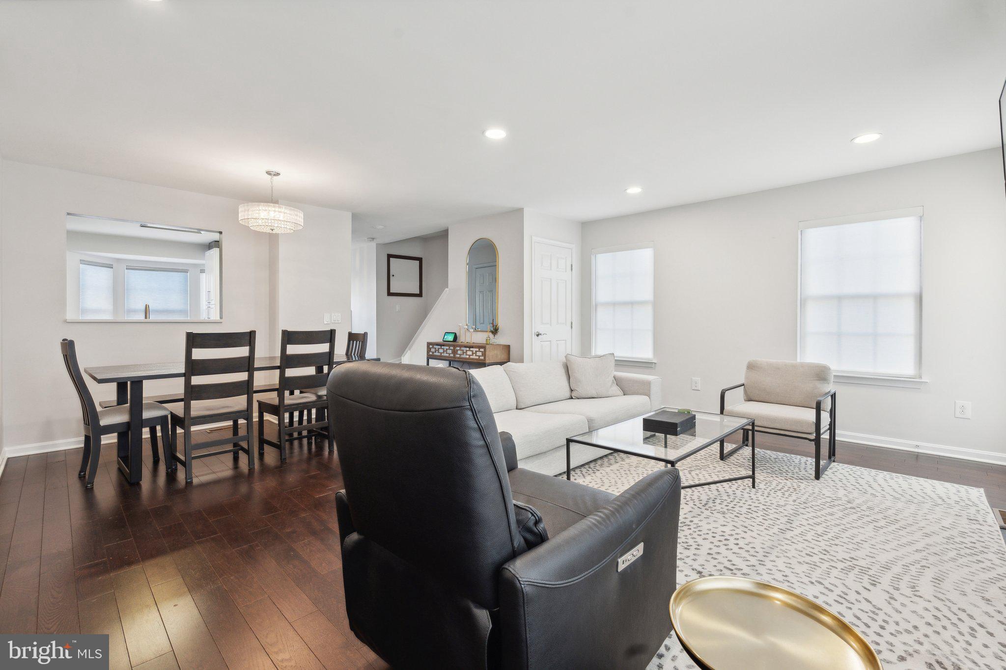 410 McDaniel Drive Purcellville, VA 20132 - Photo 19 of 36 a living room with furniture a wooden floor and a window