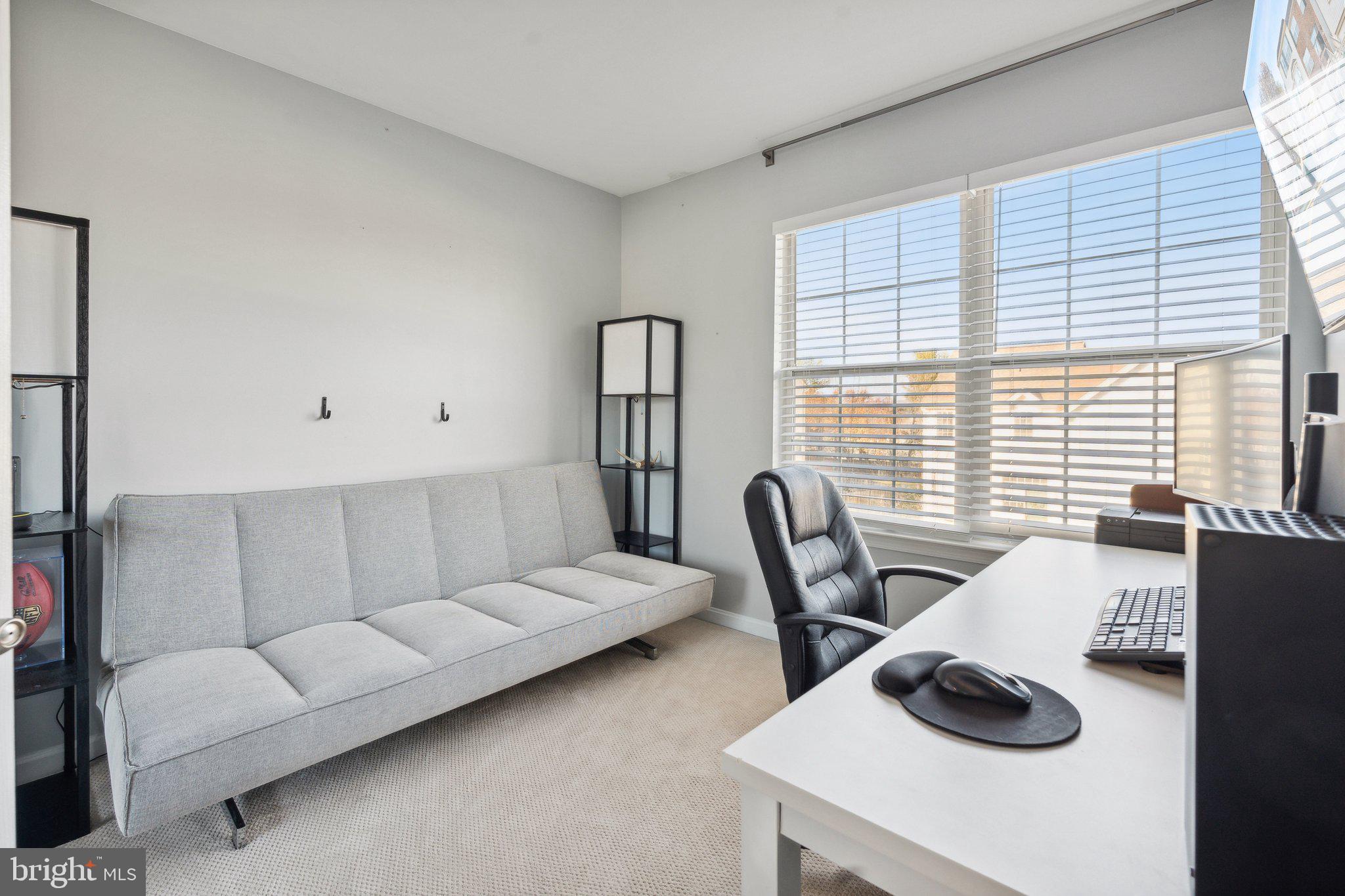410 McDaniel Drive Purcellville, VA 20132 - Photo 26 of 36 a living room with furniture and a large window