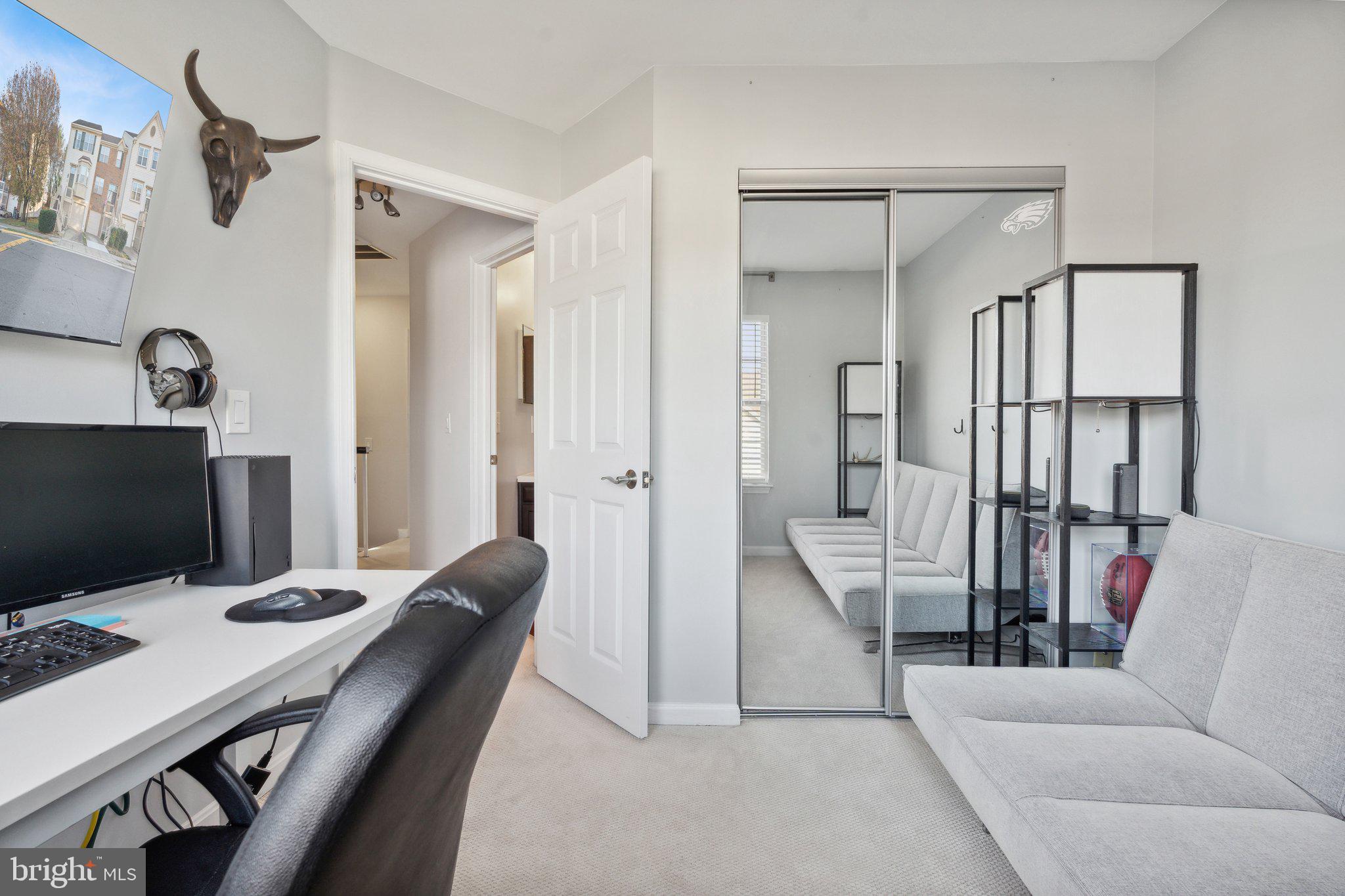 410 McDaniel Drive Purcellville, VA 20132 - Photo 27 of 36 a living room with furniture and a flat screen tv
