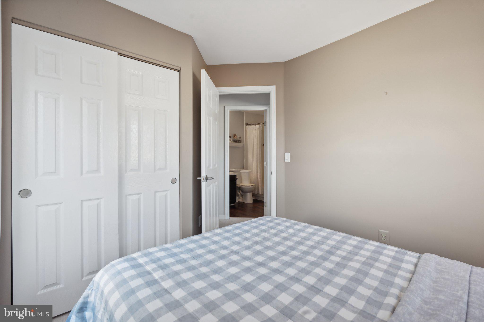 410 McDaniel Drive Purcellville, VA 20132 - Photo 32 of 36 a bedroom with a bed and a window