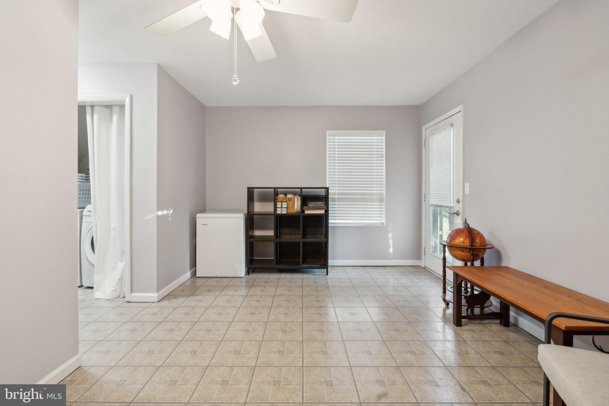 410 McDaniel Drive Purcellville, VA 20132 - Photo 33 of 36 a view of an empty room with workspace and a window