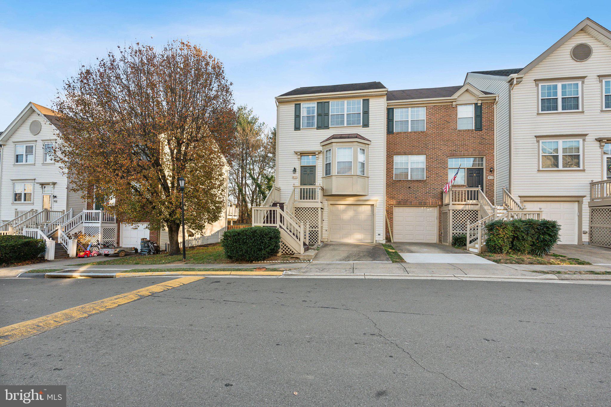410 McDaniel Drive Purcellville, VA 20132 - Photo 34 of 36 a front view of a house with a yard