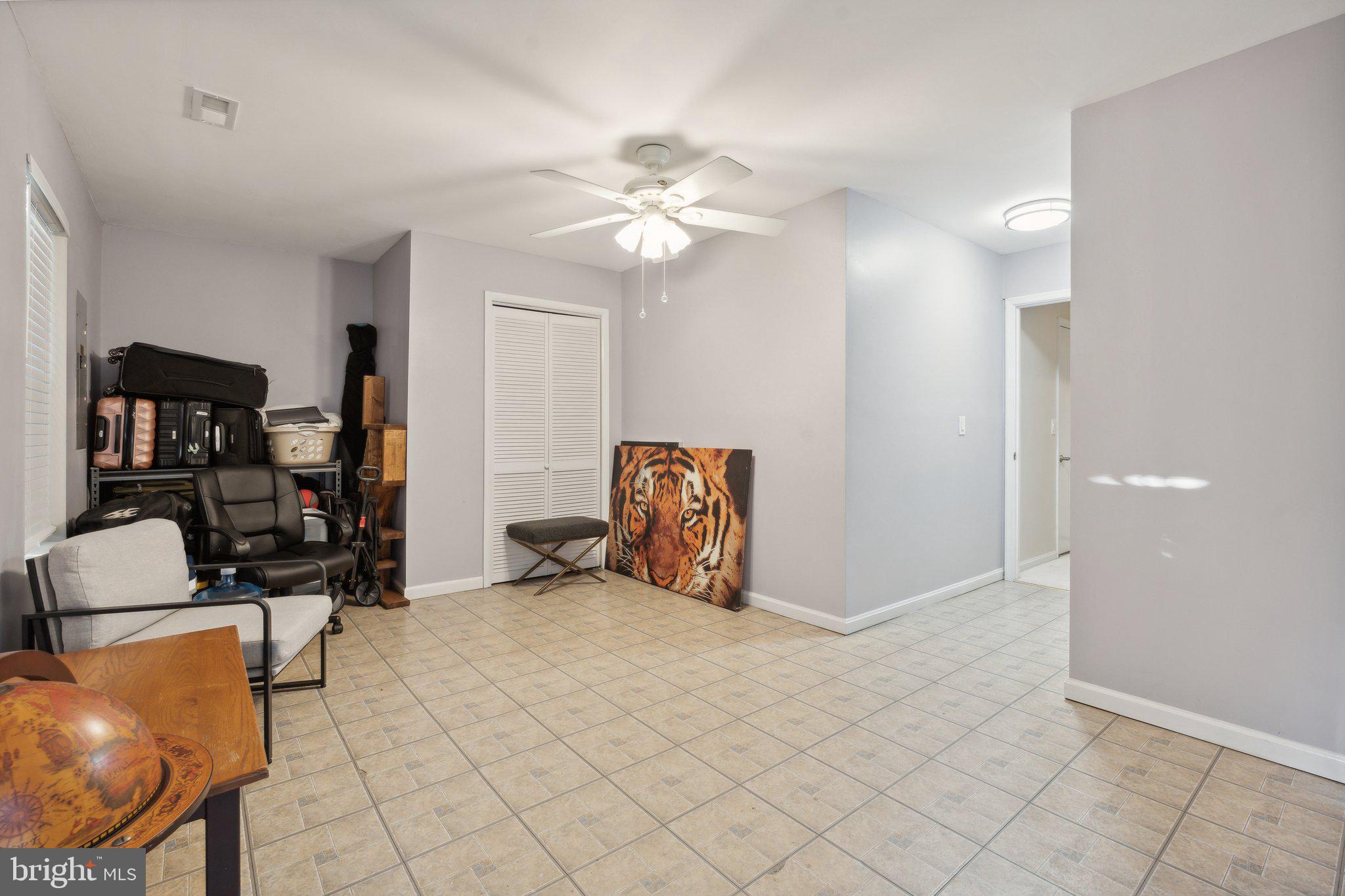 410 McDaniel Drive Purcellville, VA 20132 - Photo 35 of 36 a view of a livingroom with workspace and a window