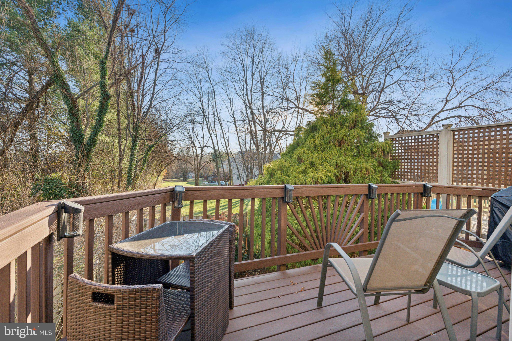 410 McDaniel Drive Purcellville, VA 20132 - Photo 5 of 36 a view of a chair and table on the deck