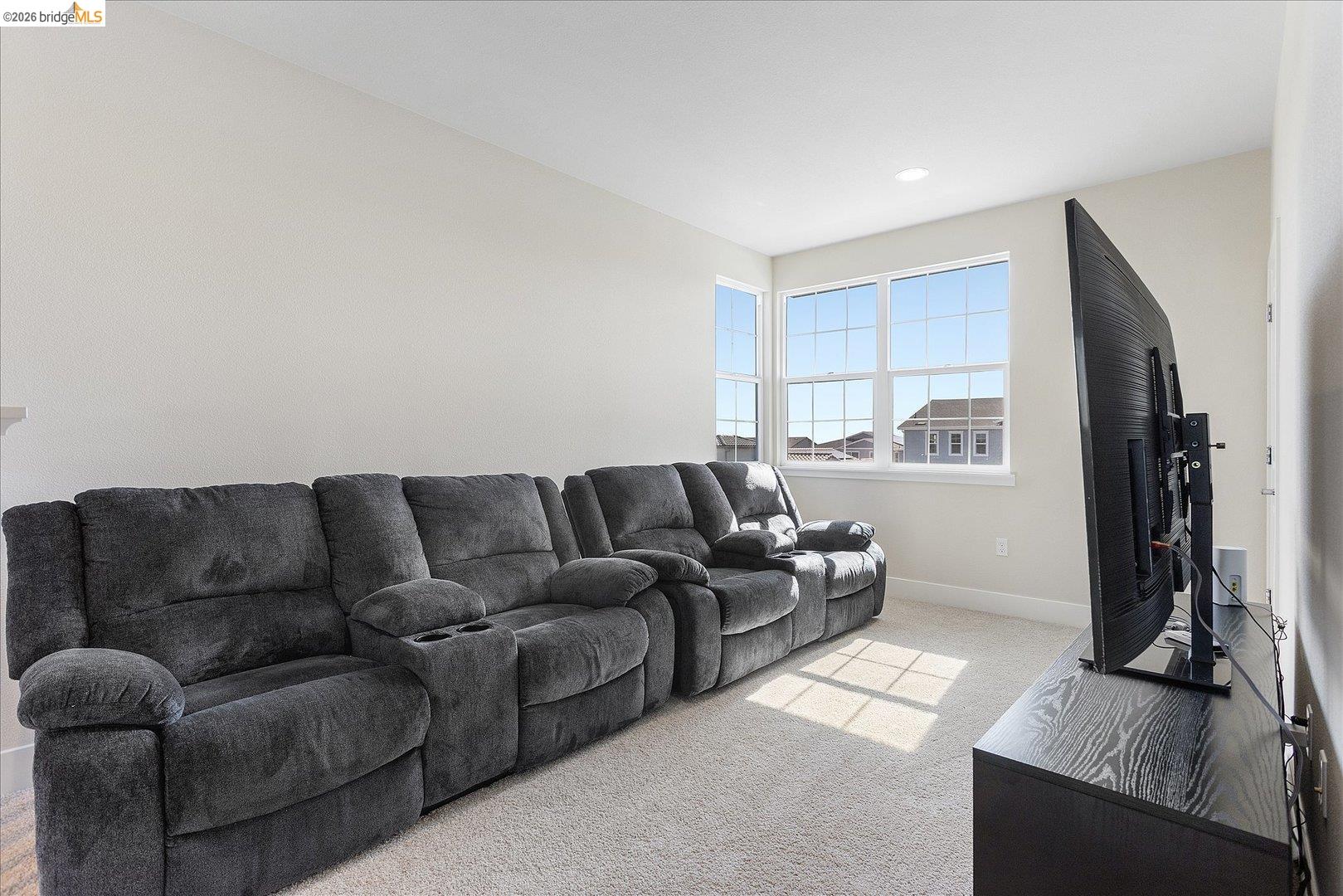 5601 Ridgepoint Way Antioch, CA 94531 - Photo 26 of 59 Carpeted room with light-toned walls and multiple windows