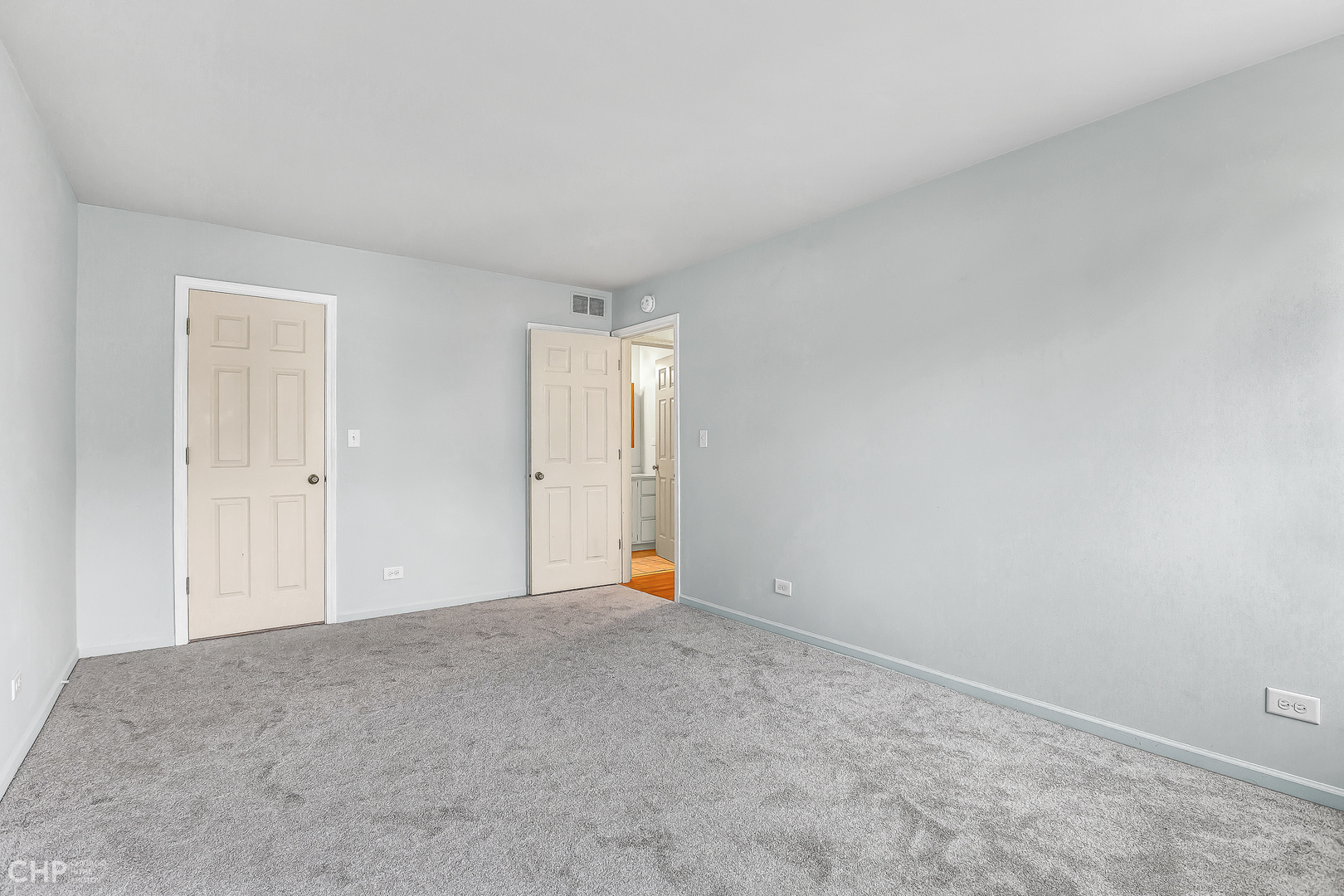 2621 College Hill Circle, Unit 63 Schaumburg, IL 60173 - Photo 14 of 21 a view of an empty room and an entryway