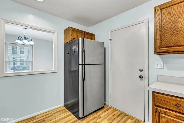 a view of kitchen and closet