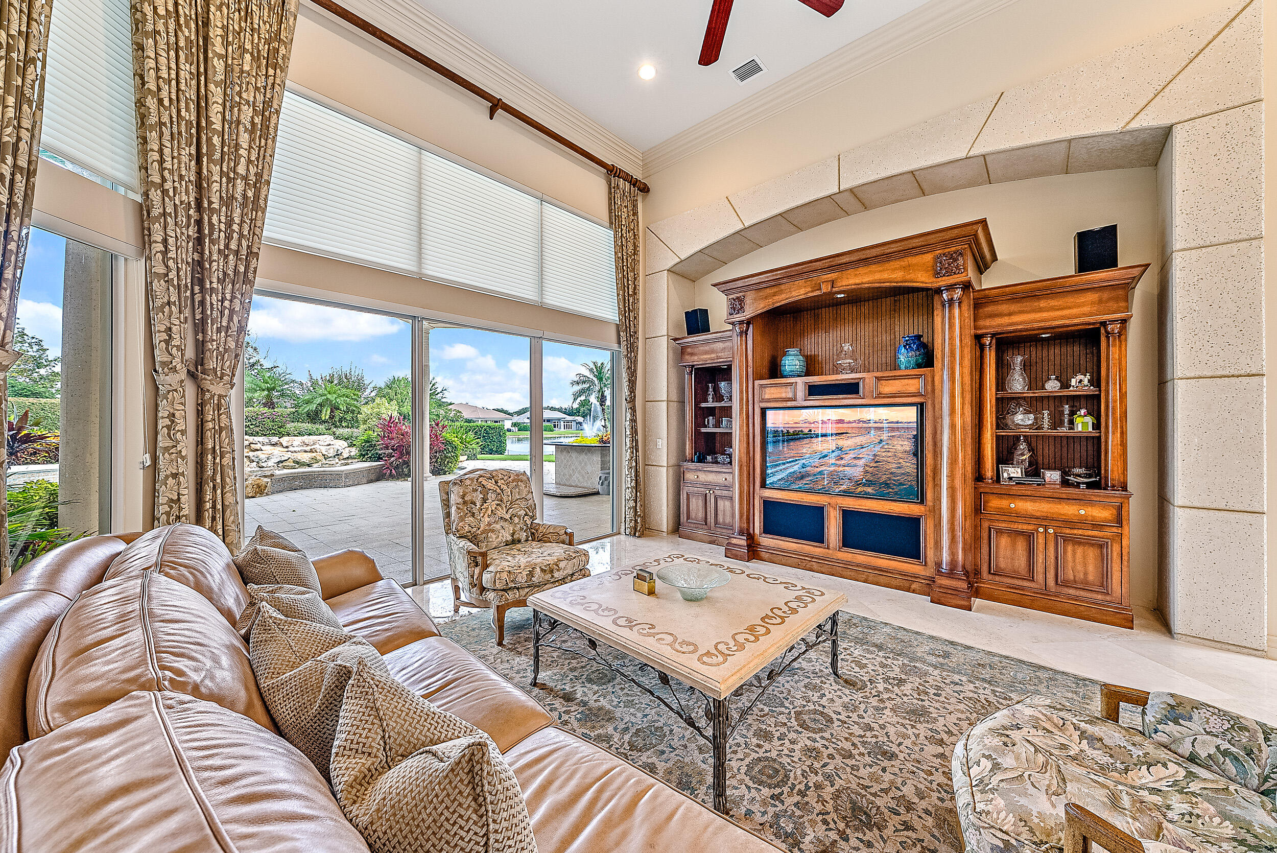 12049 Intercoastal Terrace Jupiter, FL 33469 - Photo 11 of 56 a living room with furniture a rug and a large window