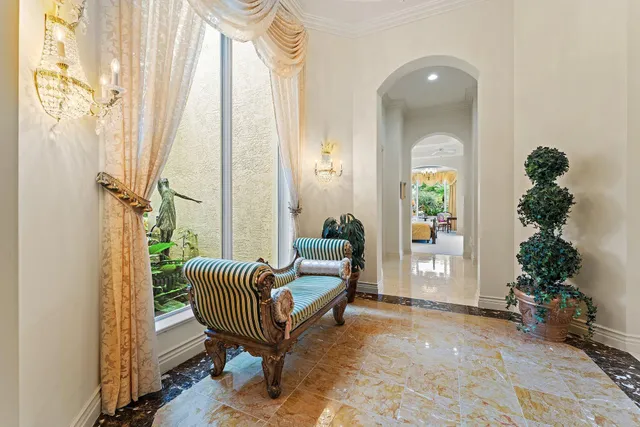 a spacious bedroom with a bed and a couch