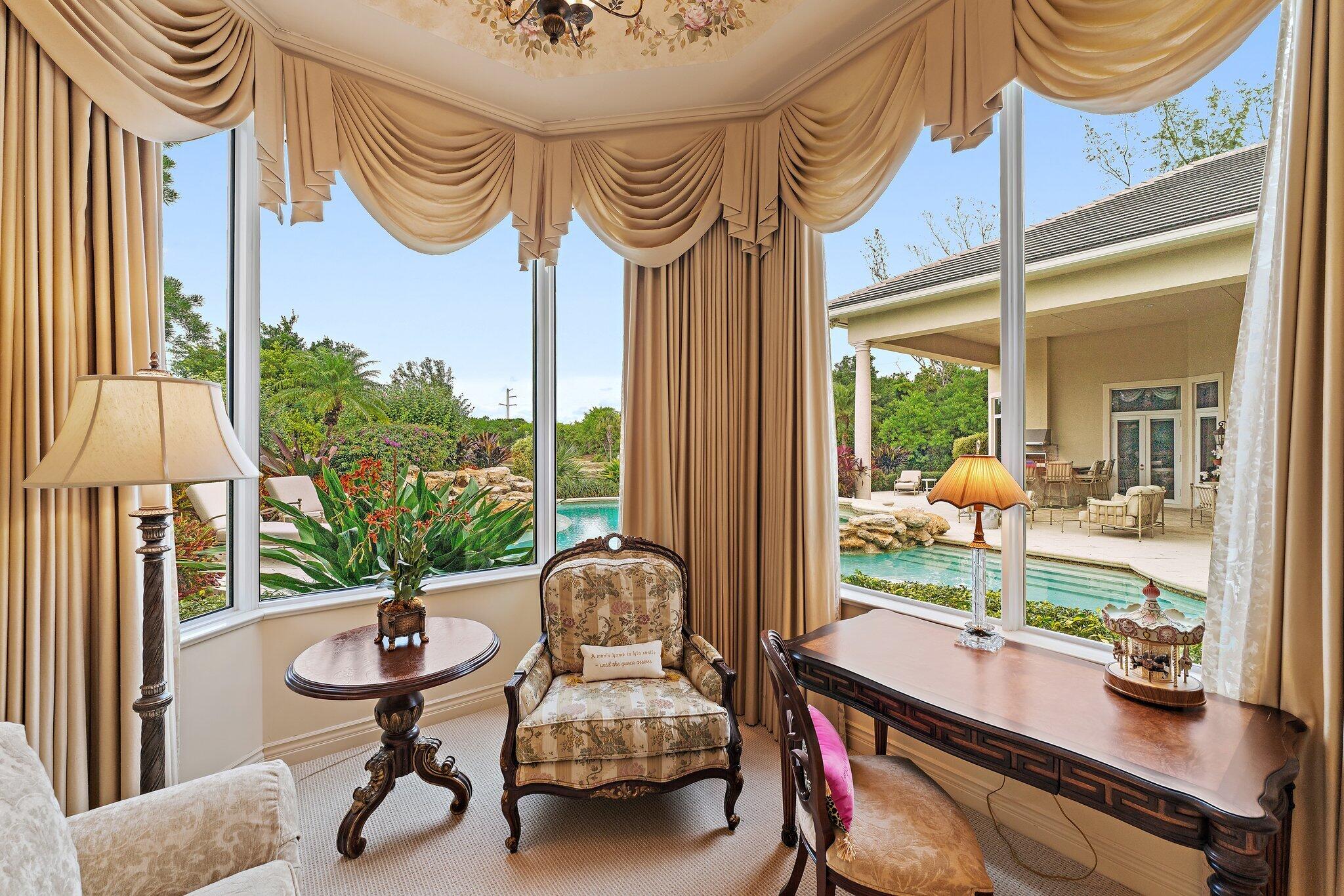 12049 Intercoastal Terrace Jupiter, FL 33469 - Photo 29 of 56 a room with furniture and a window