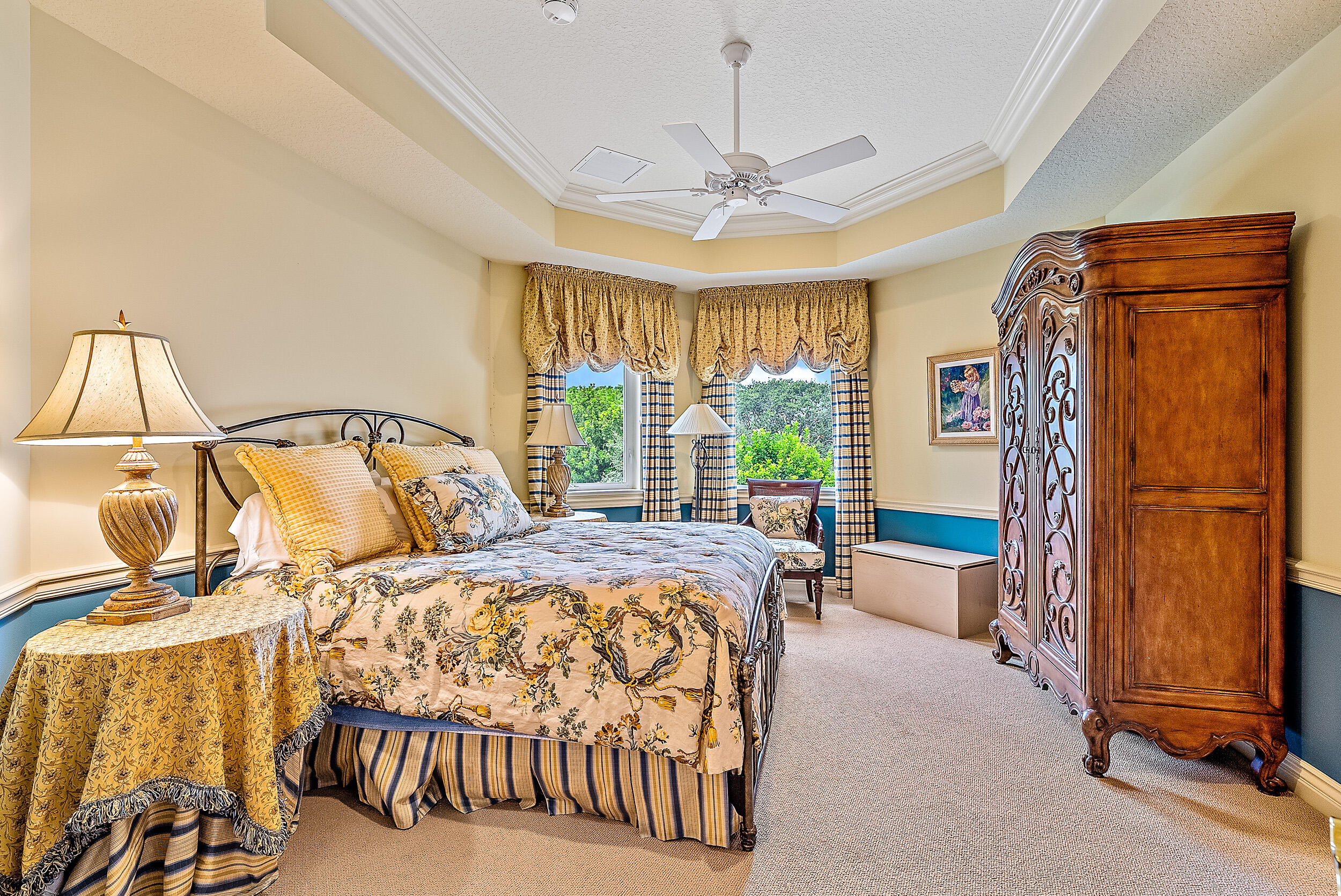 12049 Intercoastal Terrace Jupiter, FL 33469 - Photo 41 of 56 a bedroom with a bed chair and window