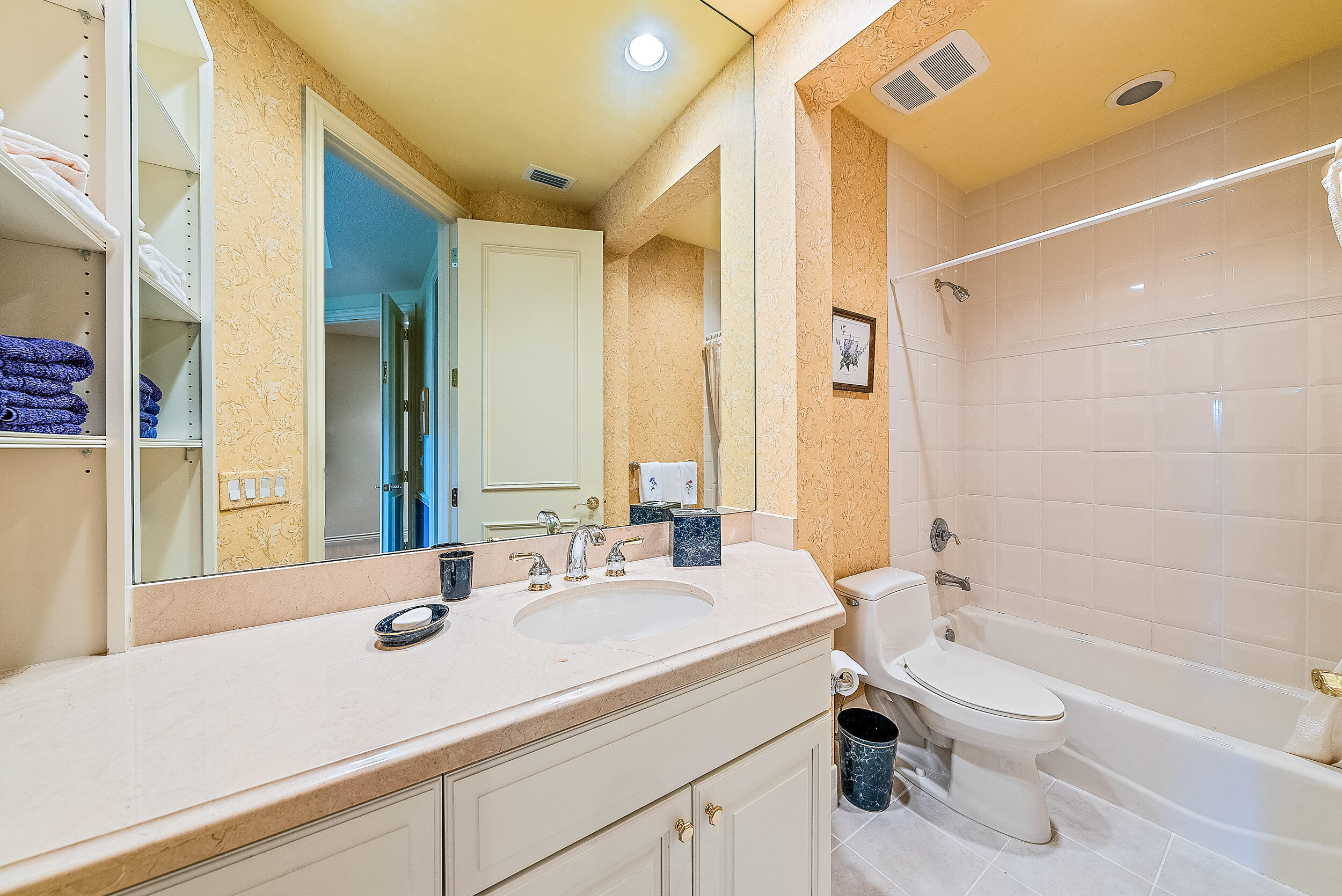 12049 Intercoastal Terrace Jupiter, FL 33469 - Photo 44 of 56 a bathroom with a sink a toilet and shower