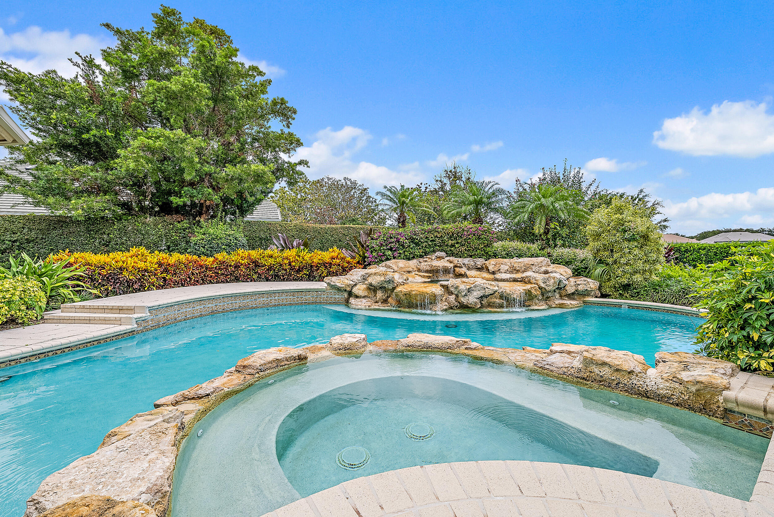 12049 Intercoastal Terrace Jupiter, FL 33469 - Photo 49 of 56 an aerial view of a house yard swimming pool and outdoor seating