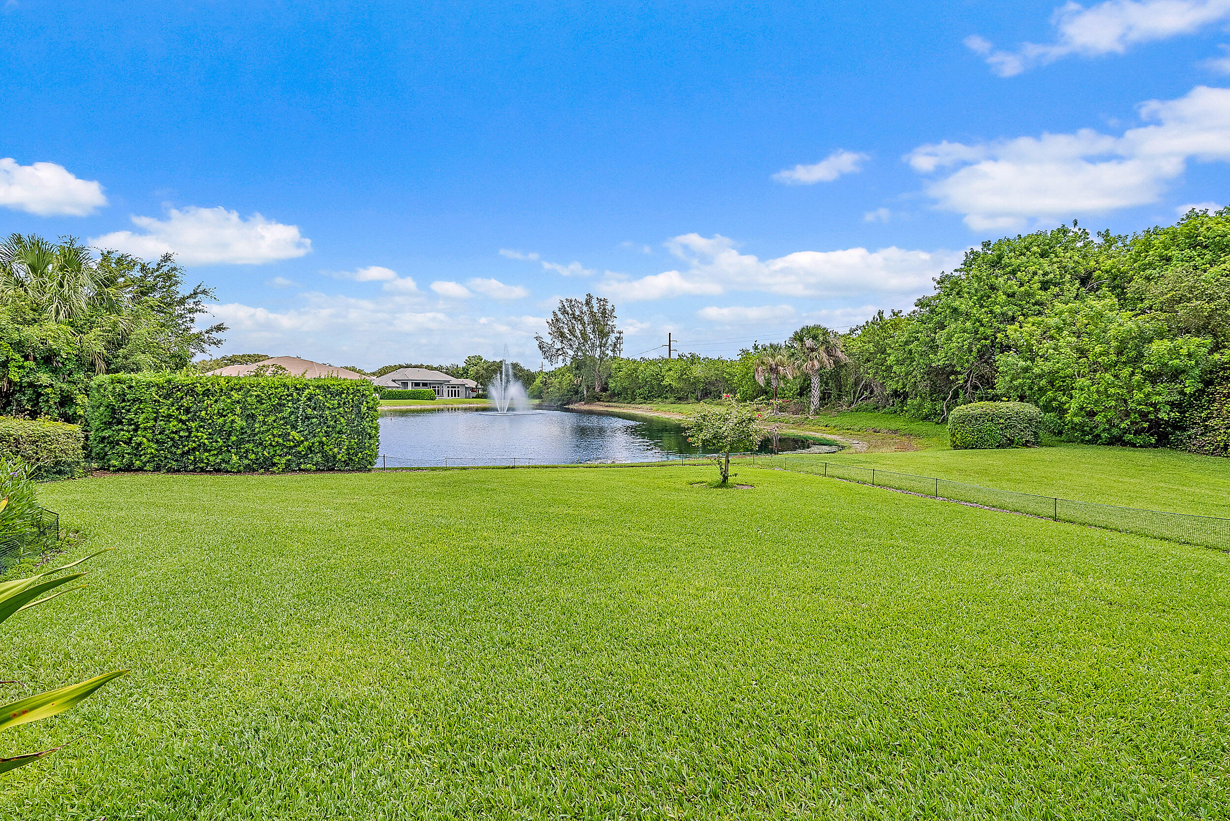 12049 Intercoastal Terrace Jupiter, FL 33469 - Photo 51 of 56 a view of a golf course with a lake