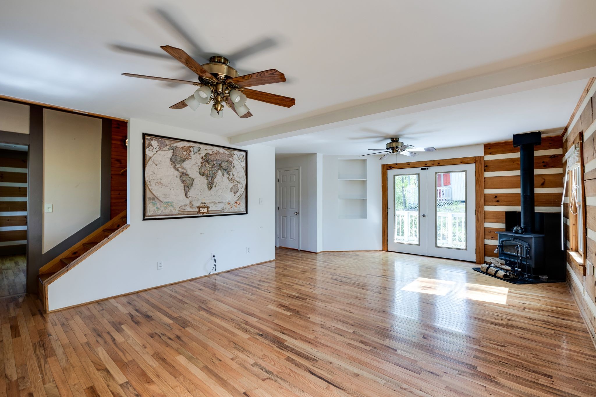 1707 Sugar Ridge Road Spring Hill, TN 37174 - Photo 11 of 38 a view of a livingroom with furniture hardwood floor and a ceiling fan
