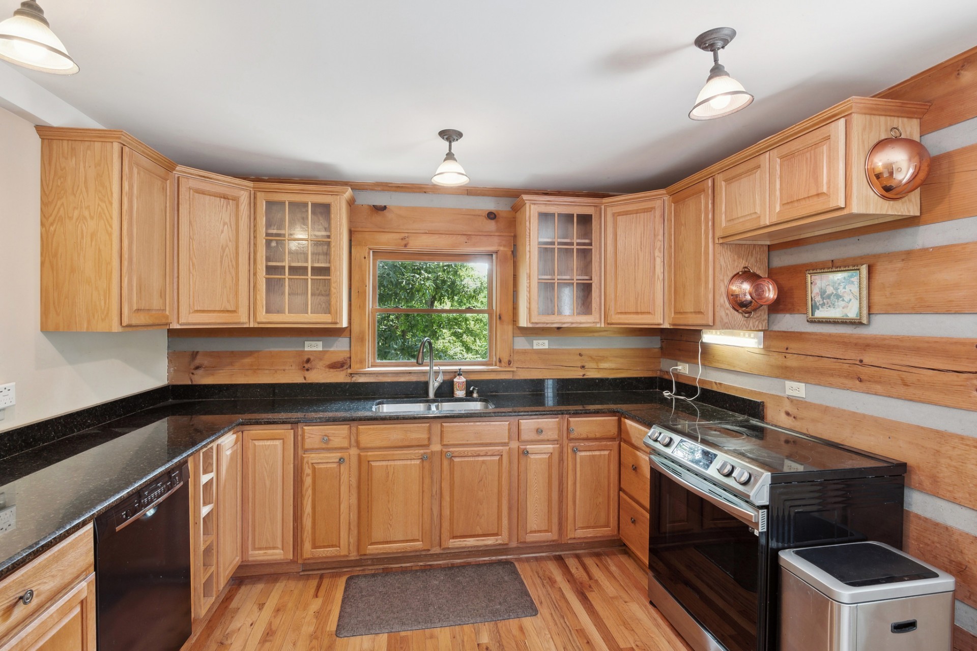 1707 Sugar Ridge Road Spring Hill, TN 37174 - Photo 2 of 5 a kitchen with a stove a sink and a window