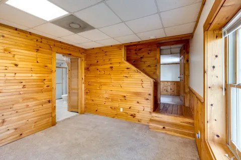 a view of a bench in a backyard