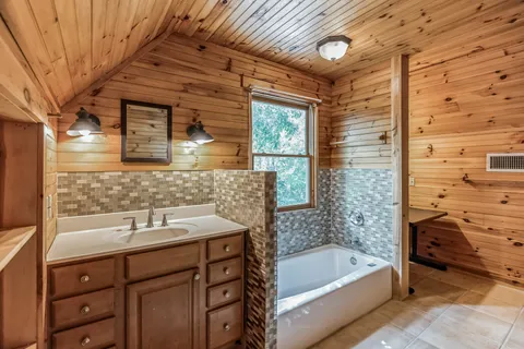 a bathroom with a sink and a bathtub