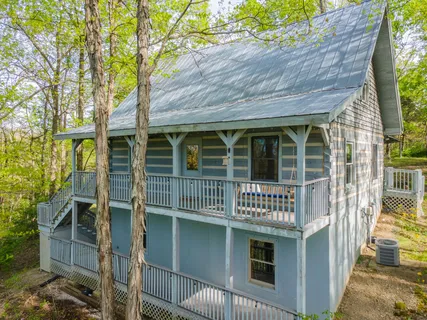 a view of hallway with wooden floor