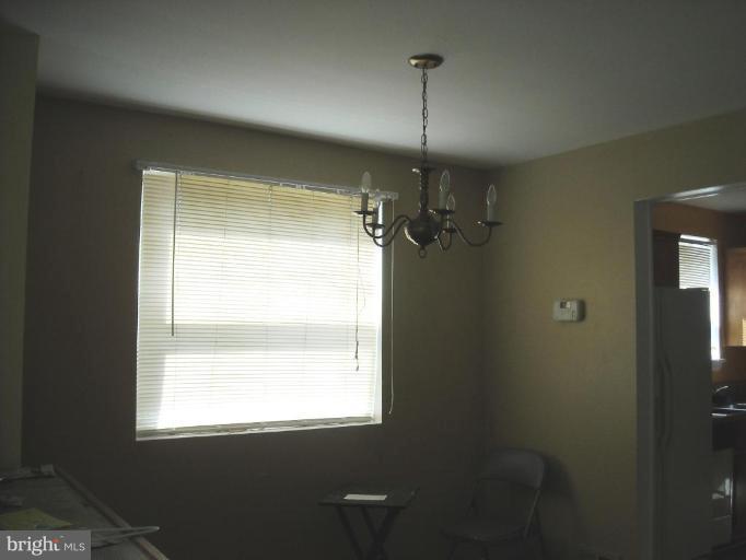 11810 Indigo Road Silver Spring, MD 20906 - Photo 3 of 7 a view of a room that has a window in it