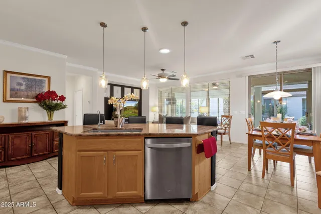 a kitchen with counter top space cabinets and stove