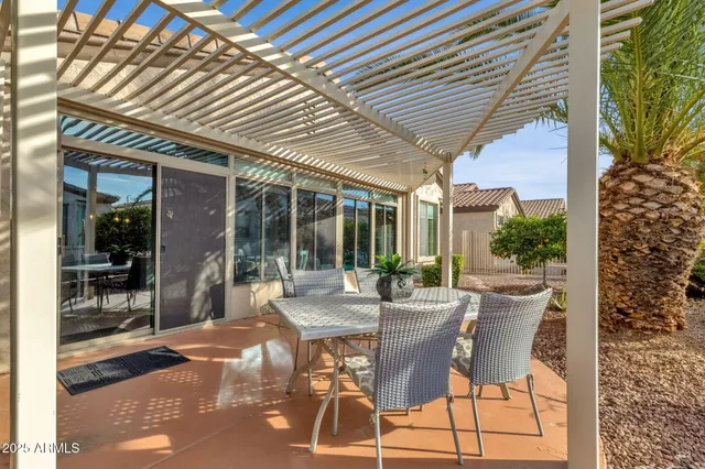 a patio with patio outdoor seating and yard