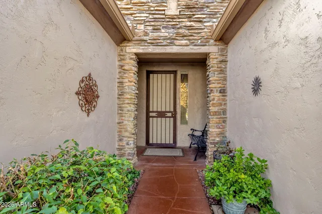 a front view of a house with a garage