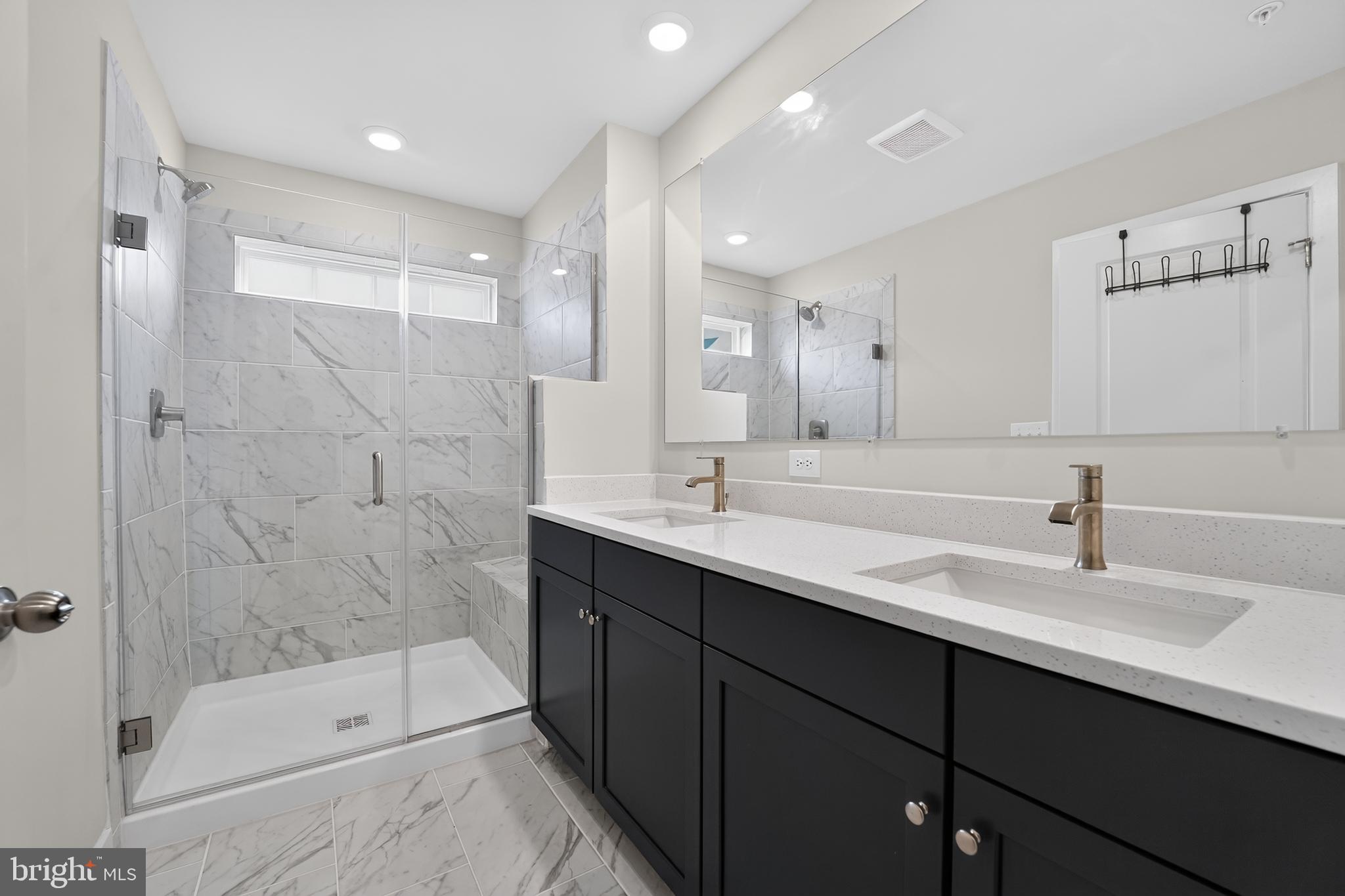 1808 Parham Way Baltimore, MD 21244 - Photo 20 of 31 Sleek modern bathroom with elegant finishes.