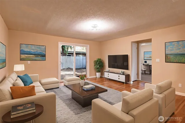 a bedroom with bed and window