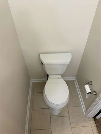 a bathroom with a toilet and a sink