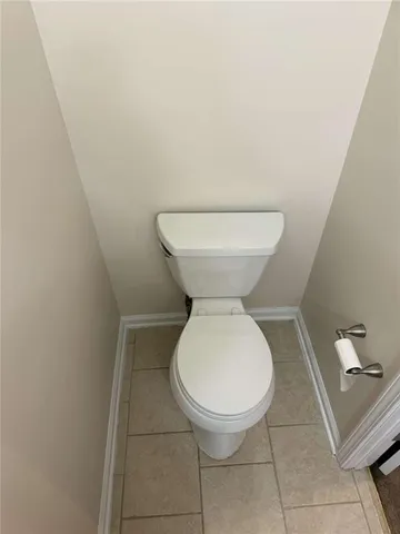 a bathroom with a toilet and a sink