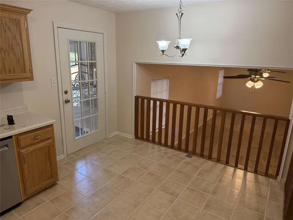 a view of a kitchen with a sink