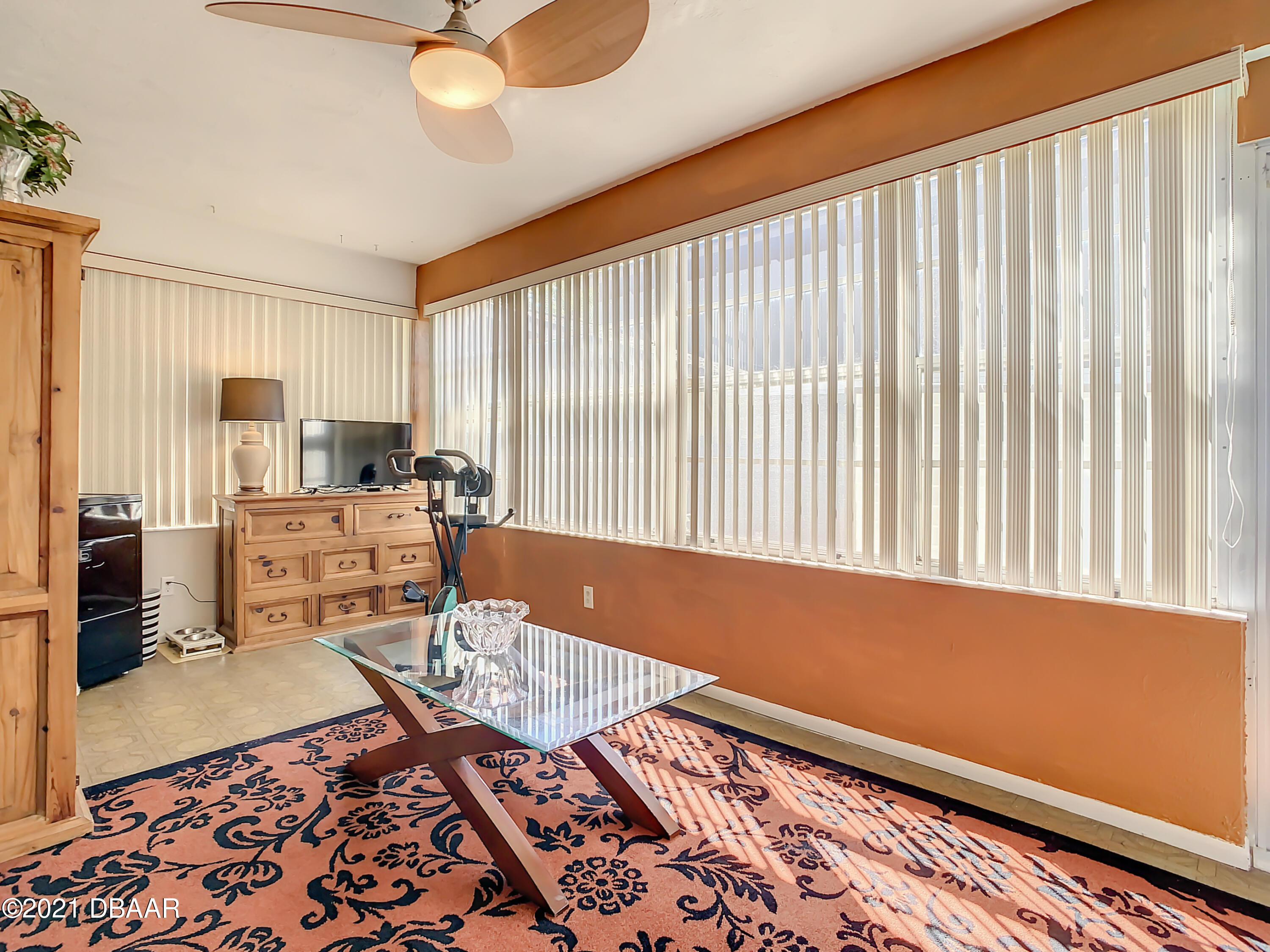 127 Cypress Pond Road Port Orange, FL 32128 - Photo 38 of 52 a living room filled with furniture and a rug