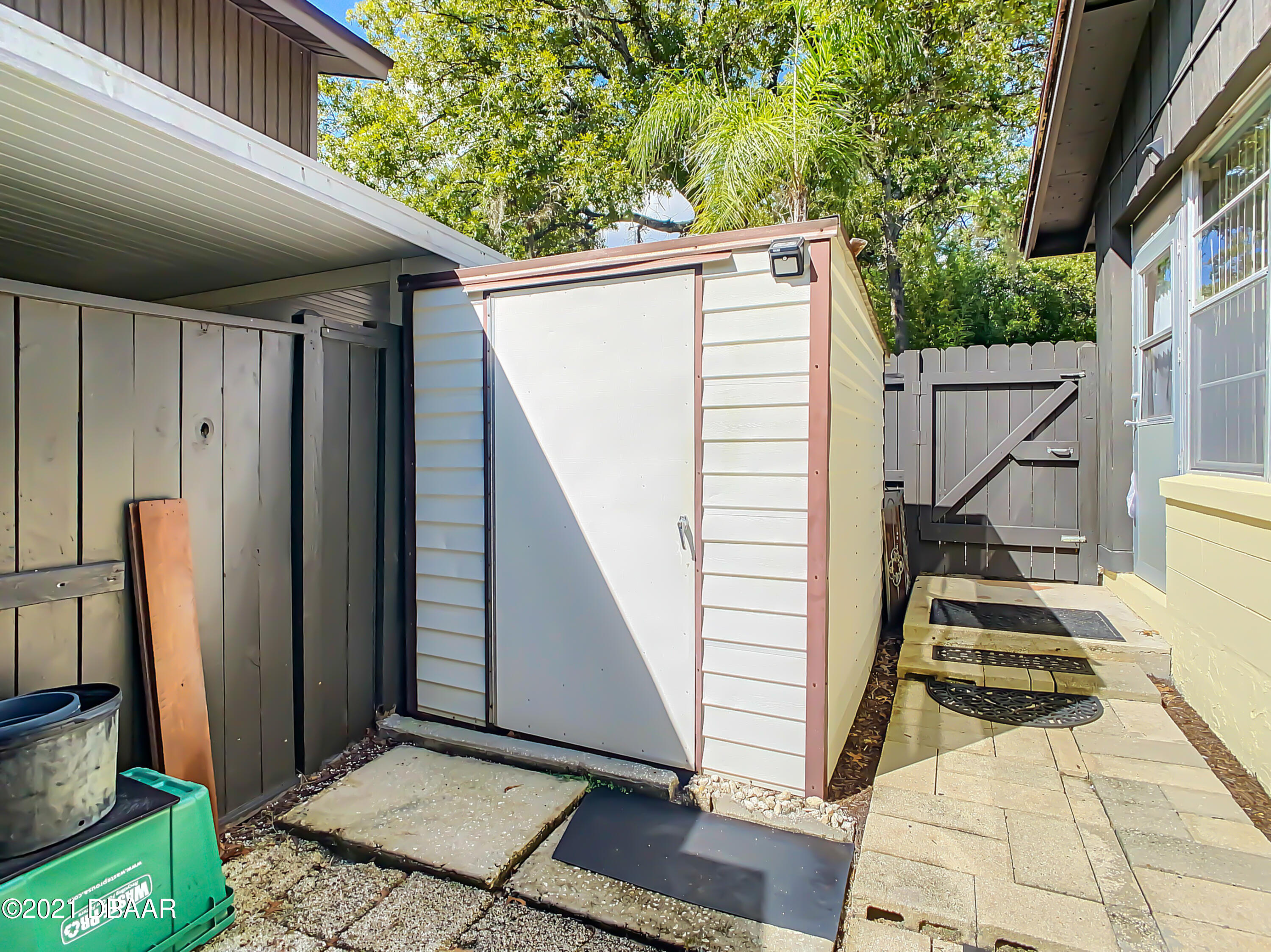 127 Cypress Pond Road Port Orange, FL 32128 - Photo 39 of 52 a view of a balcony with furniture and floor to ceiling window