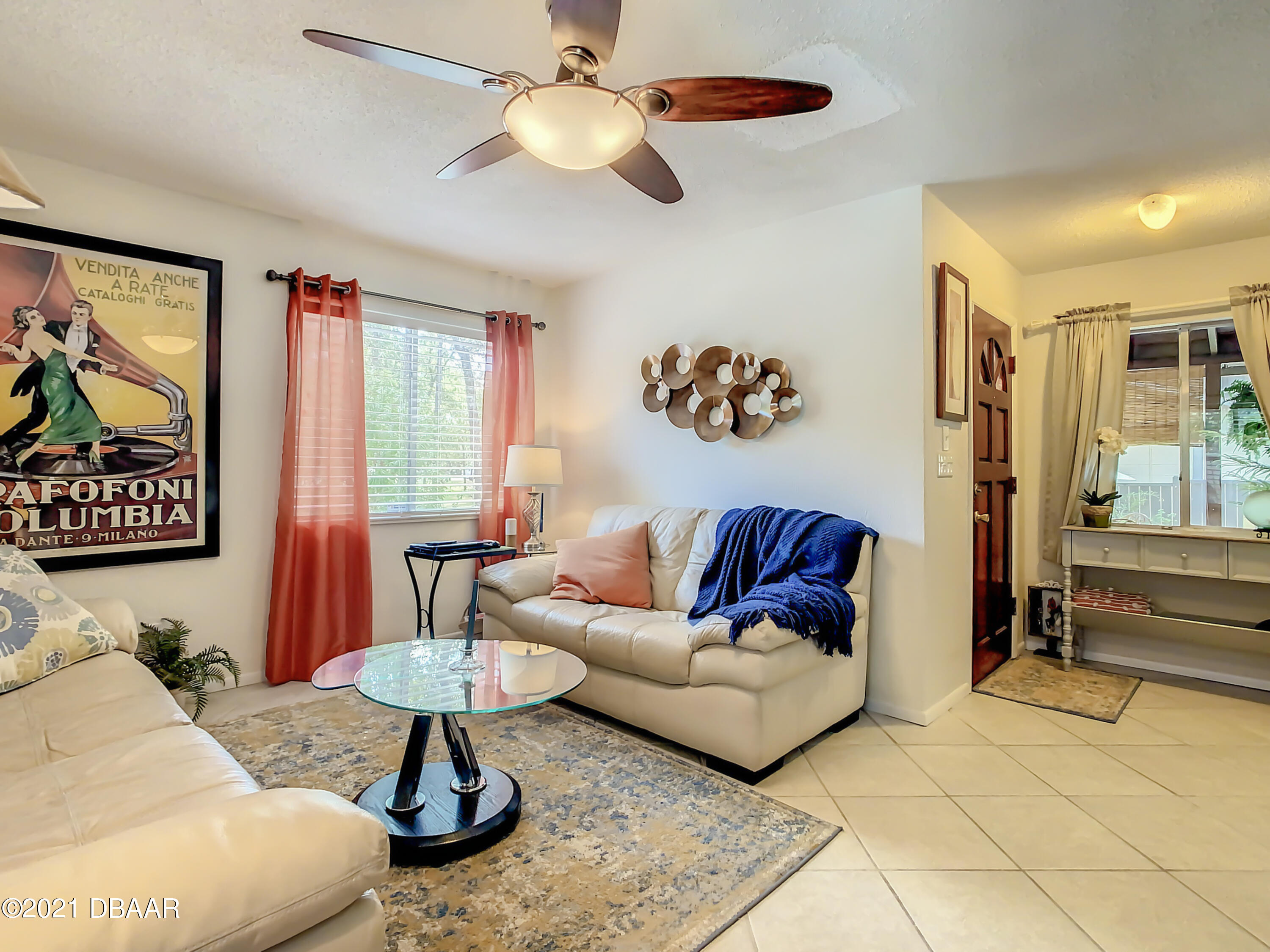 127 Cypress Pond Road Port Orange, FL 32128 - Photo 10 of 52 a living room with furniture and a large window