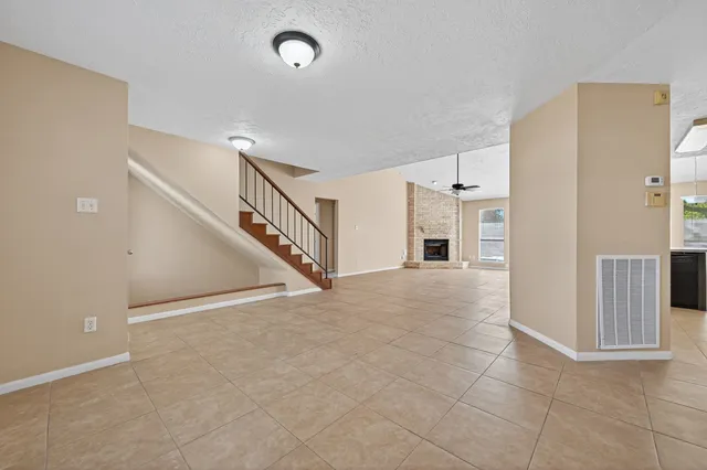 a view of a livingroom with a staircase