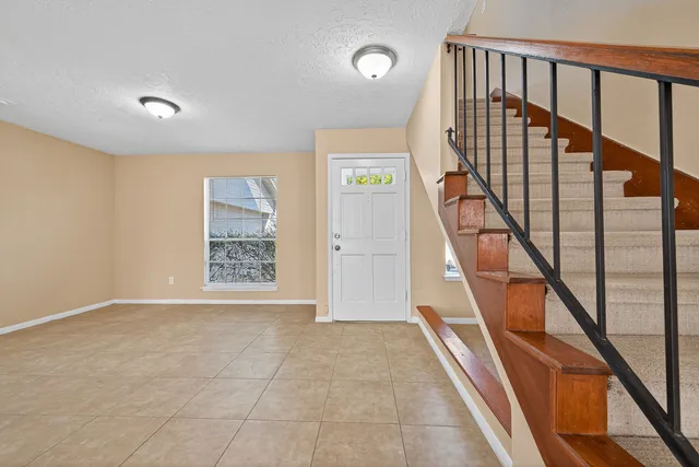 a view of an entryway with staircase