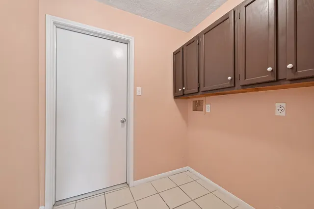 a view of a house with a garden