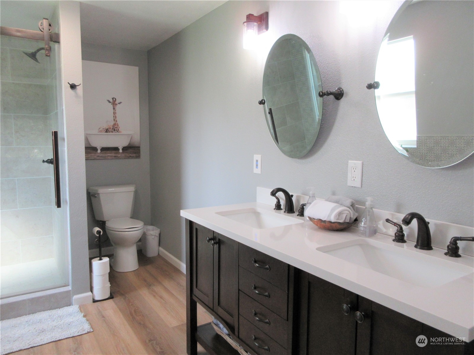 156 West Curlew Lake Road Republic, WA 99166 - Photo 14 of 36 a bathroom with a toilet sink and mirror