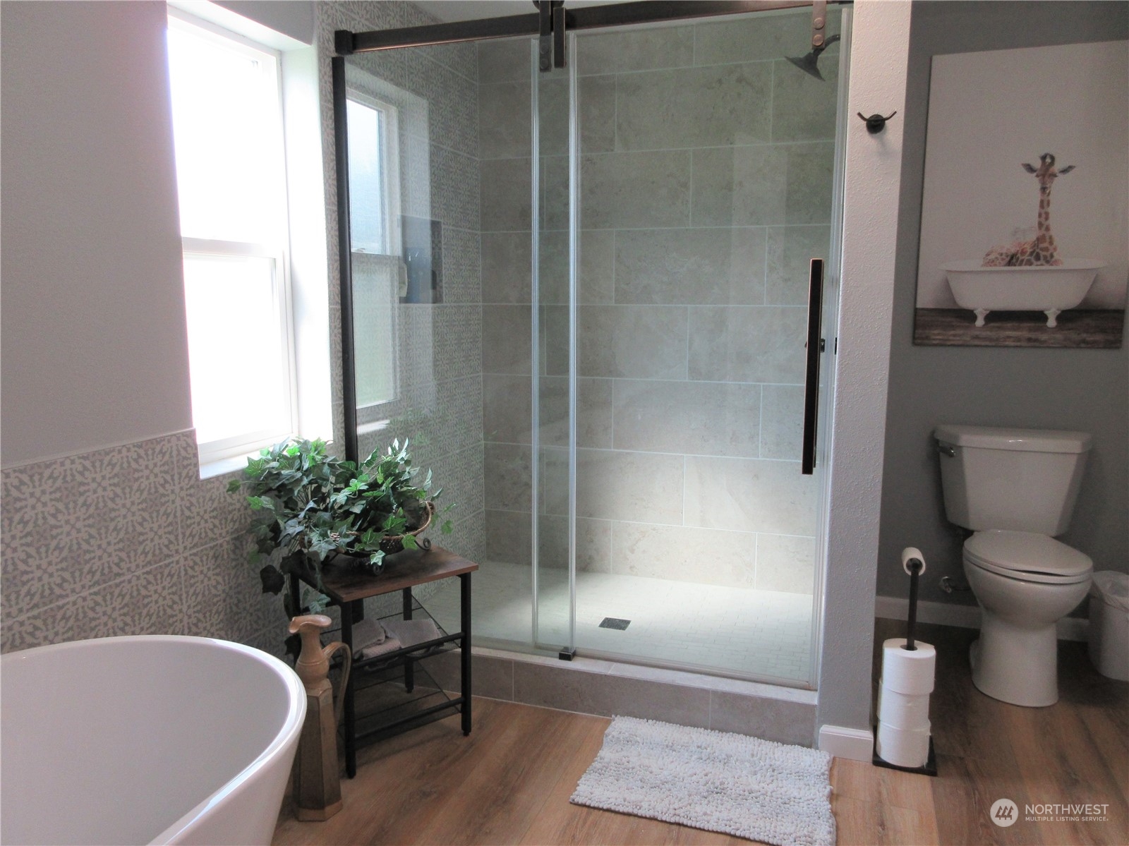 156 West Curlew Lake Road Republic, WA 99166 - Photo 15 of 36 a bath room with a toilet and a bath tub