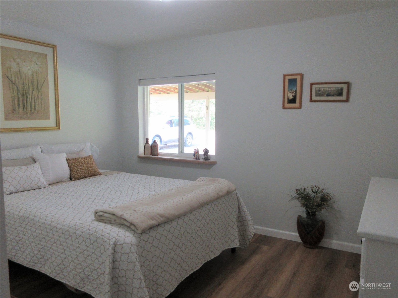156 West Curlew Lake Road Republic, WA 99166 - Photo 17 of 36 a bedroom with a bed and a window
