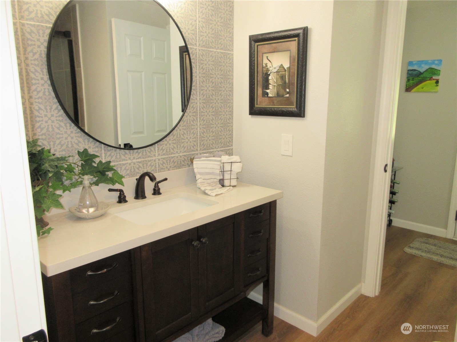 156 West Curlew Lake Road Republic, WA 99166 - Photo 18 of 36 a bathroom with a sink and a mirror